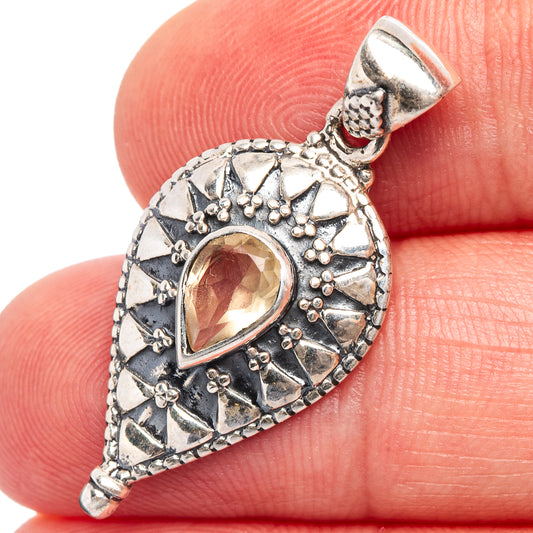Teardrop citrine pendant, .925 sterling silver with ornate engraved setting and bail