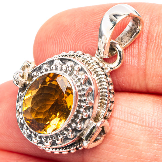 Round citrine poison pendant in .925 sterling silver with faceted yellow gemstone setting