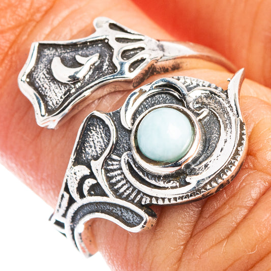 Larimar stone adjustable sterling silver ring with decorative scrollwork, top view