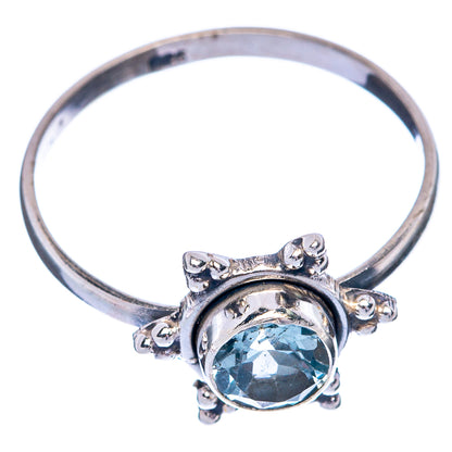 Sterling silver blue topaz dainty ring with round blue gemstone and scalloped prong halo