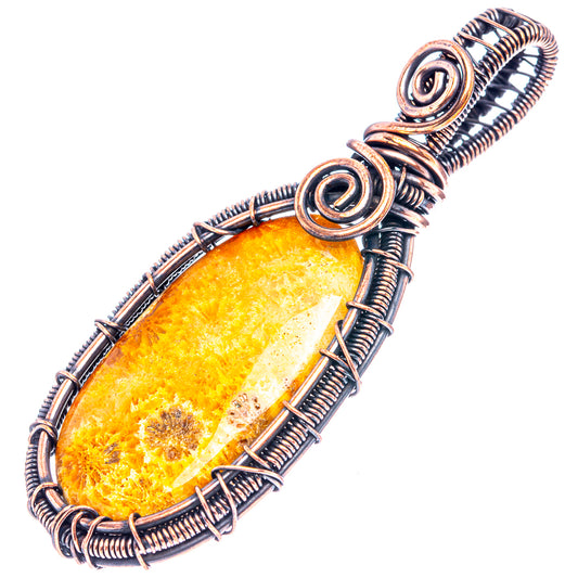 Oxidized copper wire wrap pendant with elongated oval amber stone and coil bail