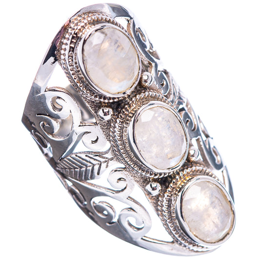 Sterling silver moonstone ring with four oval cabochons and engraved side details, size 6.25