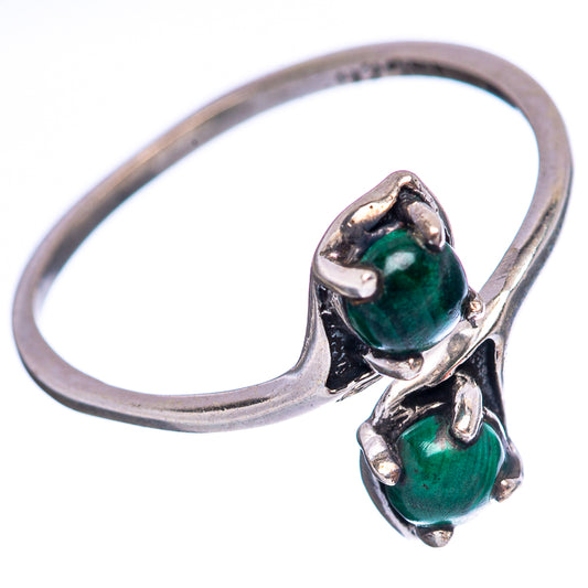 Sterling silver ring with two oval malachite green stones, size 6, curved open band