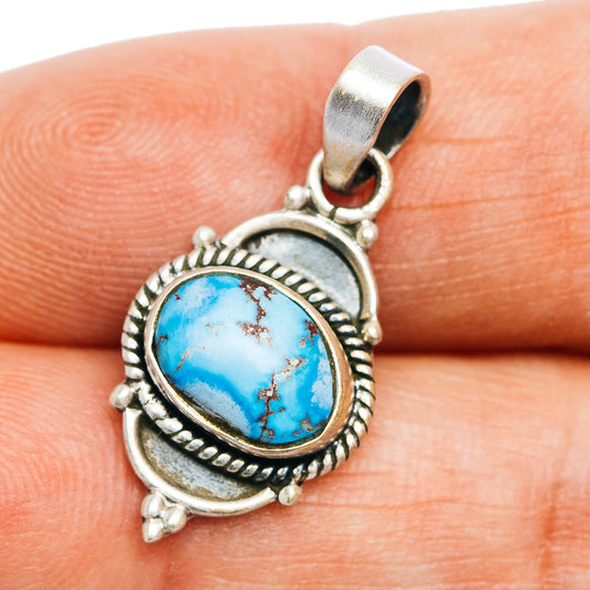 Turquoise oval pendant in .925 sterling silver with ornate rope border and bail