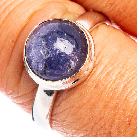 Rare tanzanite ring with oval purple gemstone in .925 sterling silver band