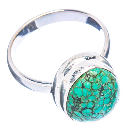 Turquoise spiderweb cabochon sterling silver ring, side view on band