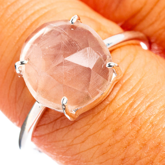 Sterling silver rose quartz ring with large round pink faceted stone and 4 prongs