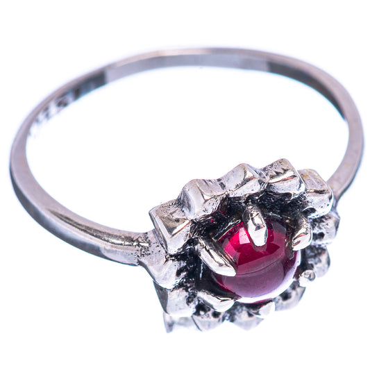 Sterling silver garnet ring size 6 with deep red center stone and scalloped halo