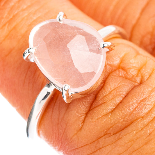Rose quartz ring with faceted teardrop stone and sterling silver prong setting