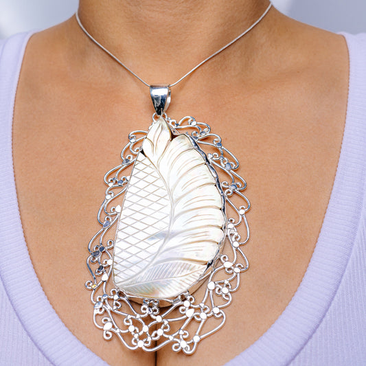 925 sterling silver mother-of-pearl teardrop pendant with ornate filigree border and chain