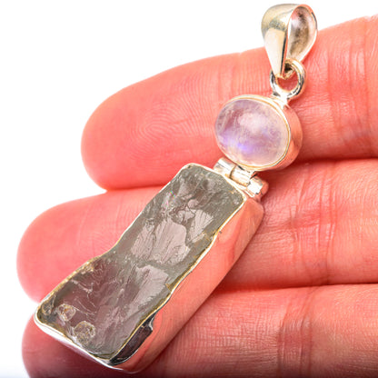 Sterling silver pendant with iridescent moonstone and rough dark aquamarine bar