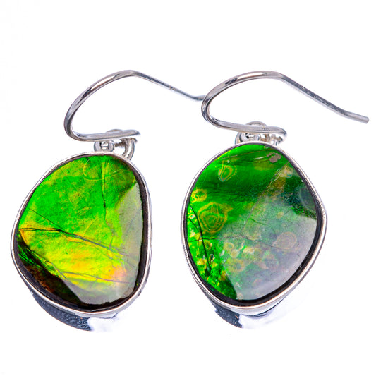 Sterling silver ammolite drop earrings with green holographic sheen and fishhook backs.