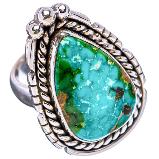 Turquoise gemstone cabochon sterling silver ring with ornate rope braid setting