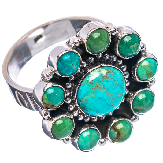 Turquoise flower ring in silver with large center oval and small green stones