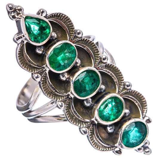 Sterling silver ring with five oval emeralds, raised halo arcs and beaded edges