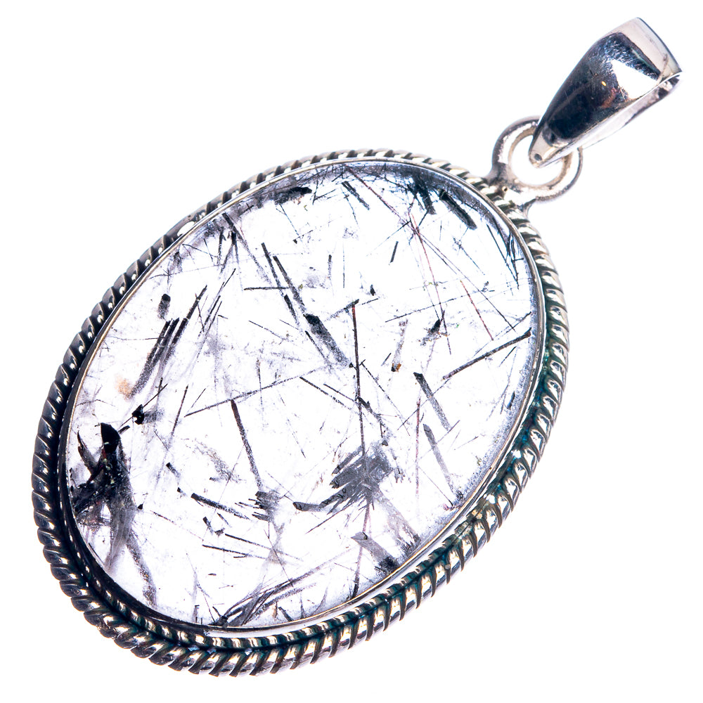 White tourmalinated quartz pendant in oval sterling silver bezel with dark needle inclusions