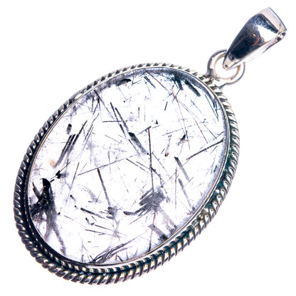 White tourmalinated quartz pendant in oval sterling silver bezel with dark needle inclusions
