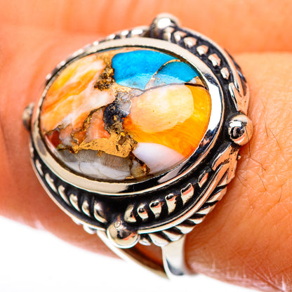 Sterling silver oval ring with turquoise and orange spiny oyster inlaid centerpiece