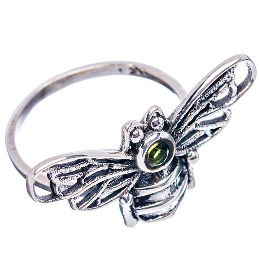 Sterling silver bee ring with peridot green oval center stone, side view, size 6.5