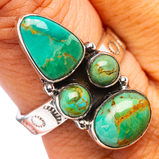 Adjustable .925 sterling silver turquoise ring with four oval cabochons, size 8