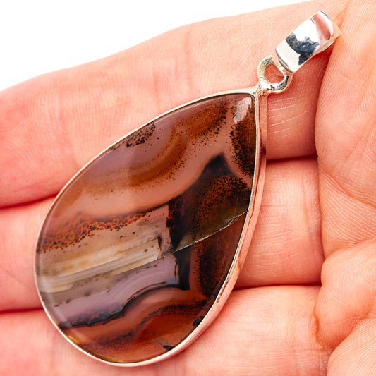 Brown Montana agate teardrop pendant in .925 sterling silver bezel and bail