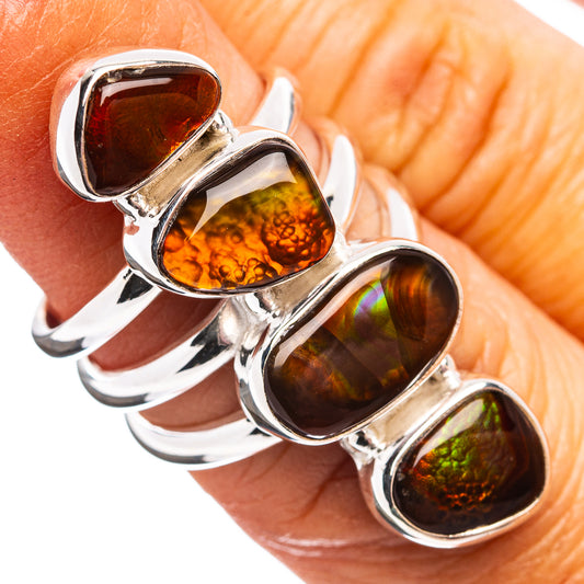 Sterling silver ring with four fire agate cabochons, rainbow and dark red-brown tones