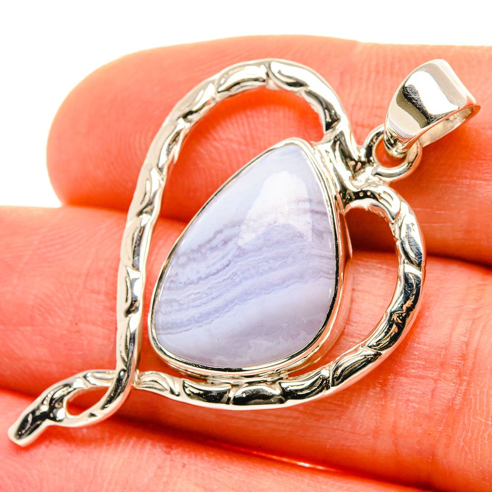 Sterling silver lace agate teardrop pendant with blue-purple banded stone and bail