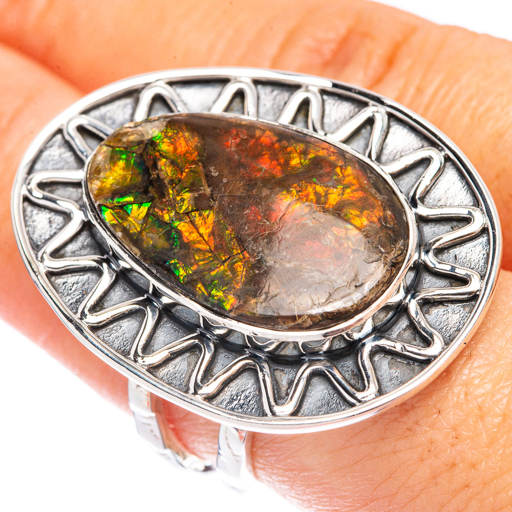 Sterling silver ammolite oval ring, size 8.5, ornate bezel with green-orange glow