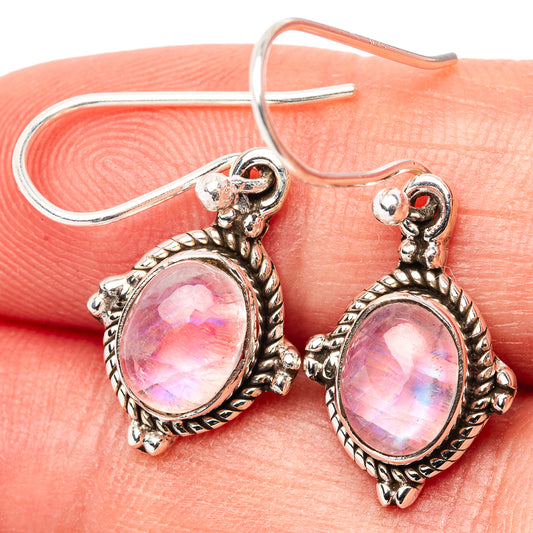Pink oval moonstone drop earrings, ornate sterling silver bezels on fishhook wires