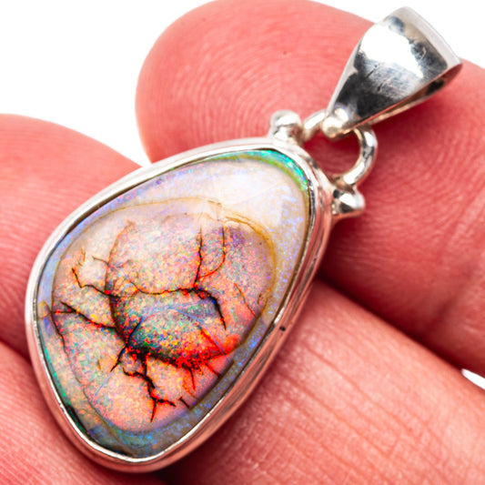 Oval opal pendant in .925 sterling silver bezel, multicolor fire with crack pattern.