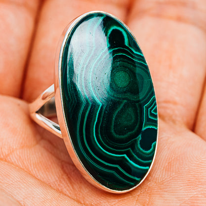 Malachite oval cabochon ring with green swirl stone on polished sterling silver band
