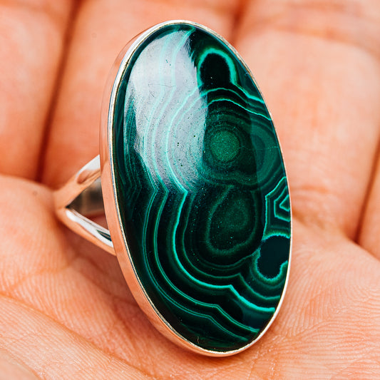 Malachite oval cabochon ring with green swirl stone on polished sterling silver band