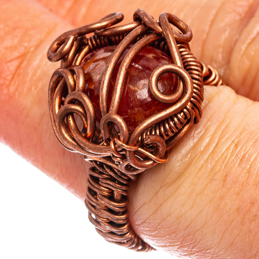 Oxidized copper wire wrap ring with oval red rhodochrosite stone, size 7