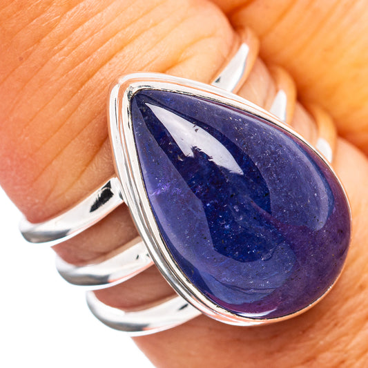 Teardrop tanzanite ring in 925 sterling silver on hand, deep blue stone