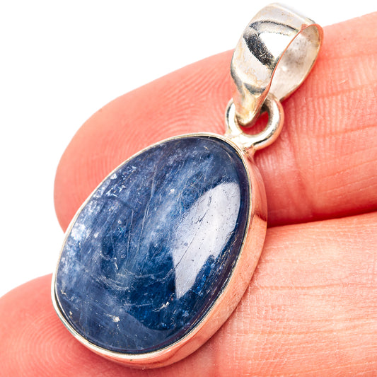 Oval kyanite pendant in .925 sterling silver, blue stone with polished bezel and loop bail.