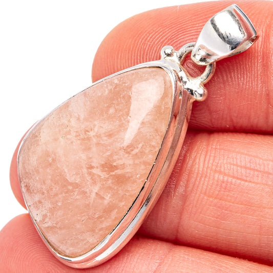 Rose quartz teardrop pendant with .925 sterling silver frame and bail