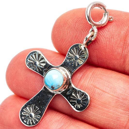 Turquoise cross pendant in .925 sterling silver with round blue center stone