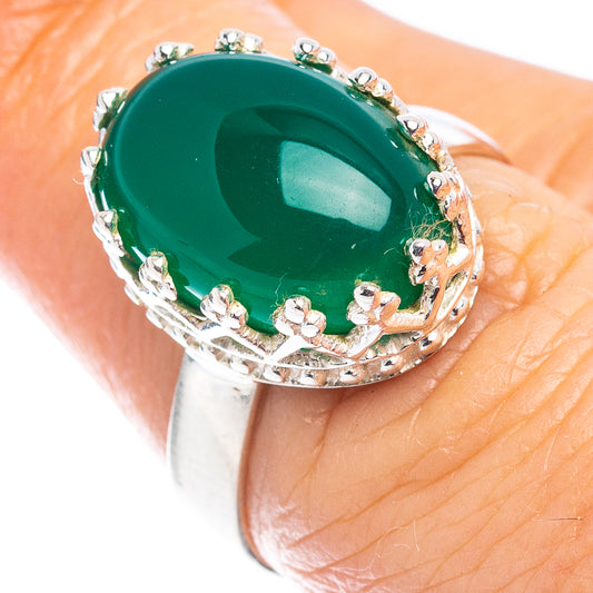 Sterling silver ring with oval green onyx cabochon and ornate prong setting