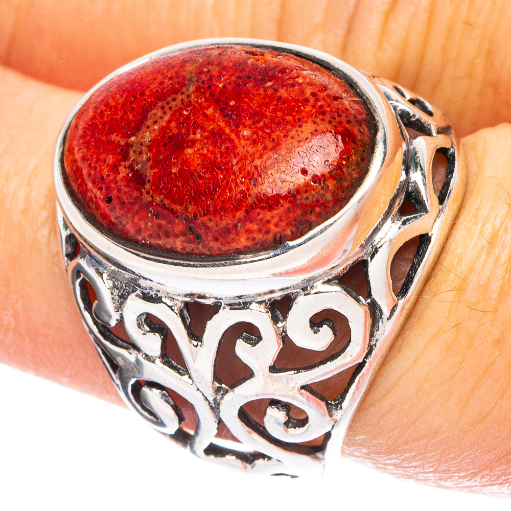 Sterling silver ring with oval red sponge coral cabochon and ornate openwork band