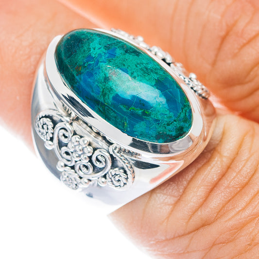 Sterling silver ring with oval green chrysocolla stone and ornate side filigree