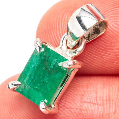 Sterling silver emerald pendant with green rectangular gemstone and hinged bail