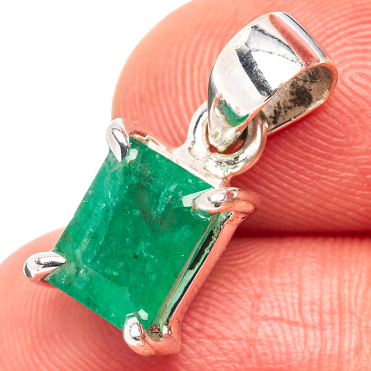 Sterling silver emerald pendant with green rectangular gemstone and hinged bail