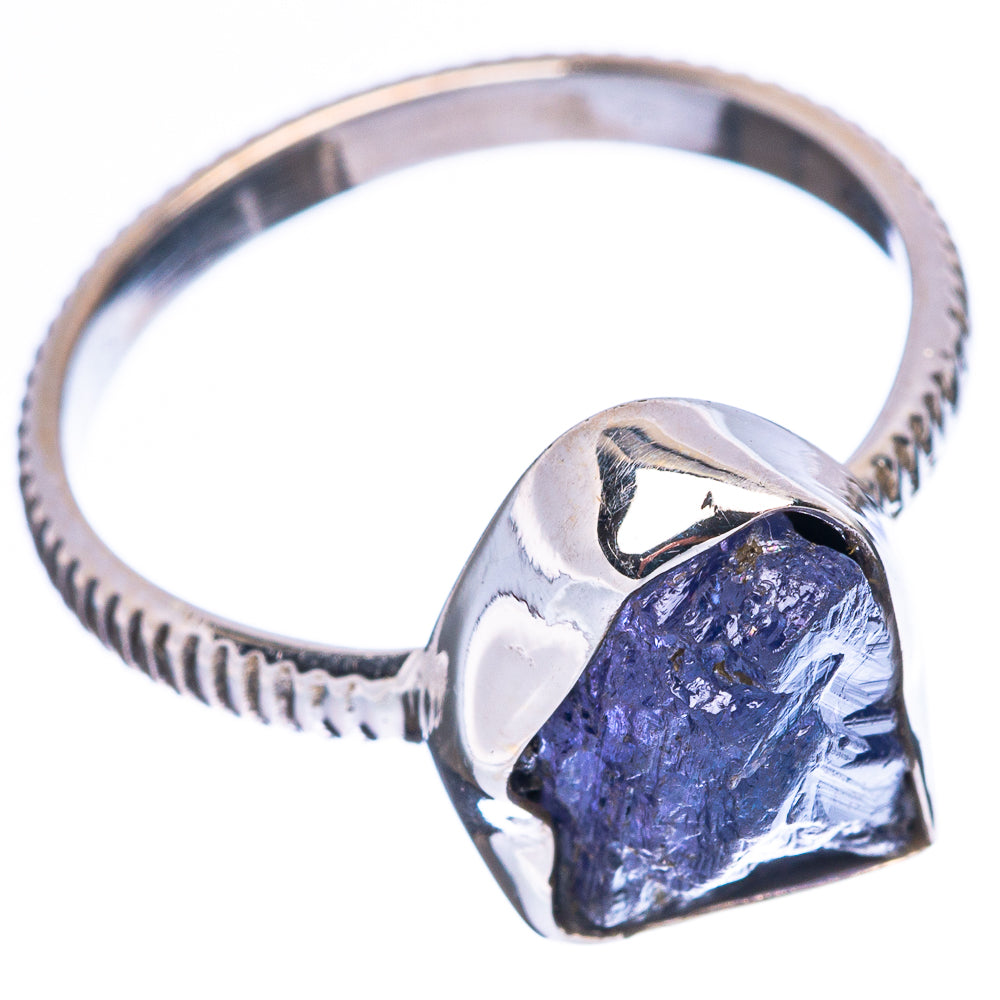 Sterling silver ring with dark blue tanzanite stone set in raised bezel