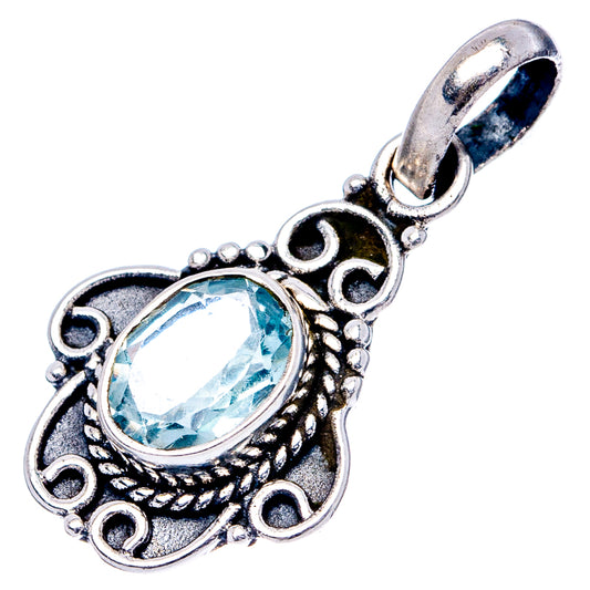 Sterling silver blue topaz pendant with oval faceted gemstone and scrolling bail for chain