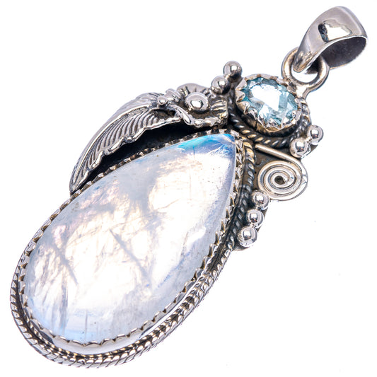 Sterling silver moonstone pendant with teardrop rainbow moonstone, blue stone, ornate bail and scrolls