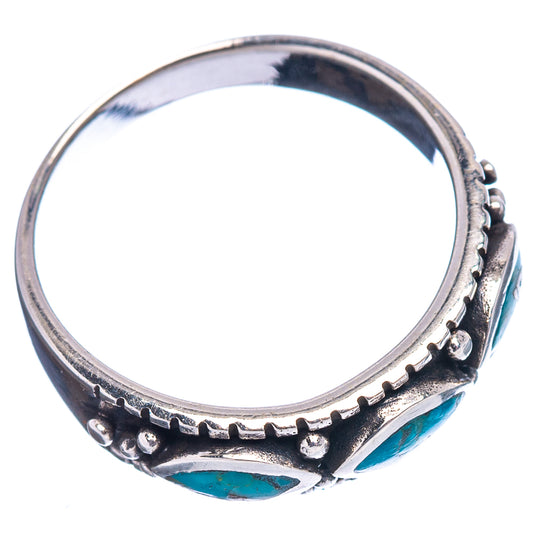 Sterling silver turquoise ring, oval inlays around engraved shank with raised bezel settings