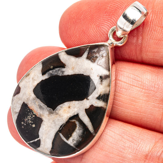 Large teardrop septarian pendant detail in .925 sterling silver with bold black, white veining