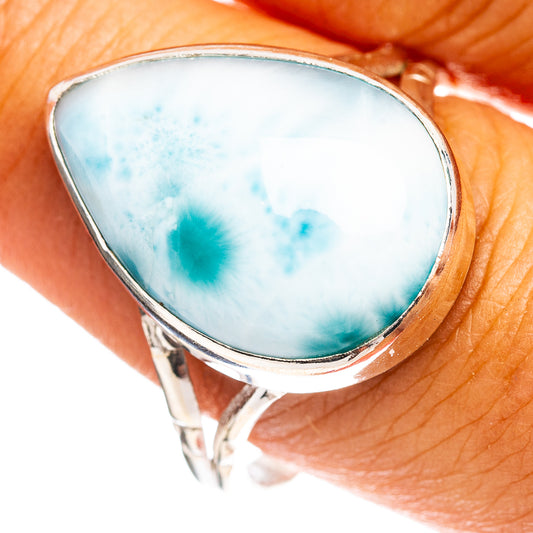 Sterling silver ring with oval light-blue larimar gemstone, bezel set