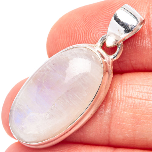 Oval moonstone pendant with .925 sterling silver bezel, close-up on pale rainbow stone