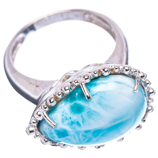 Sterling silver larimar cabochon ring with open side prongs and blue oval stone